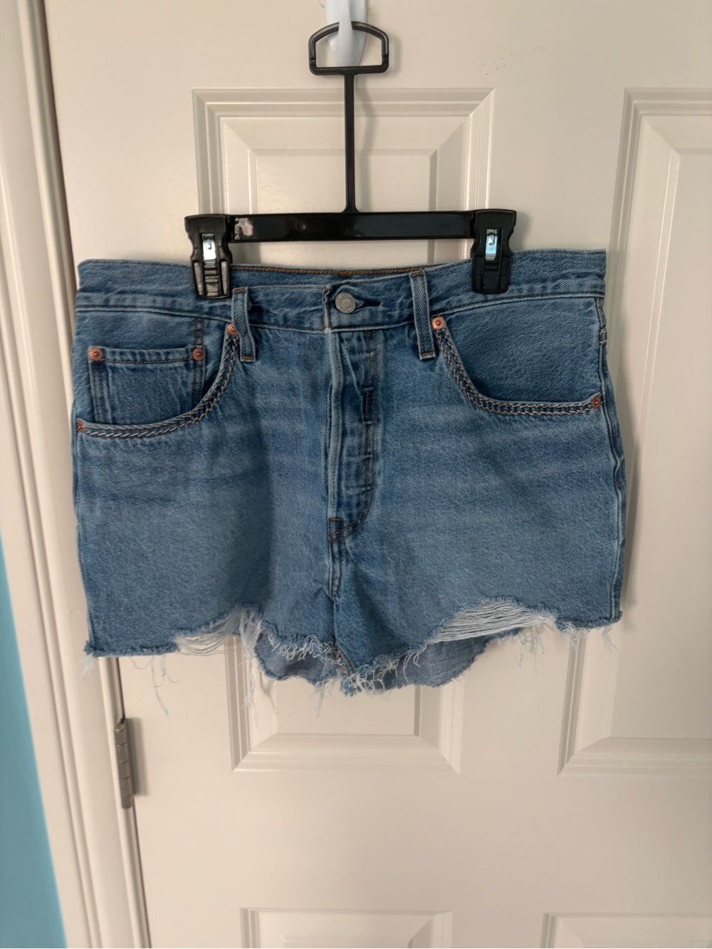Levi’s Frayed Hem Light Blue Denim Jean Shorts